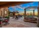 Resort-style backyard oasis with a large pool, spa, and seating area at 10612 E Winter Sun Dr, Scottsdale, AZ 85262