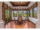Breakfast nook with round table, four chairs and large windows at 10612 E Winter Sun Dr, Scottsdale, AZ 85262