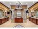 Large Primary bathroom with soaking tub, double vanities, and a walk-in shower at 10612 E Winter Sun Dr, Scottsdale, AZ 85262