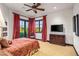 Spacious bedroom with private balcony and mountain views at 10612 E Winter Sun Dr, Scottsdale, AZ 85262