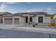 Single-story home with two-car garage and desert landscaping at 16686 S 18Th Way, Phoenix, AZ 85048