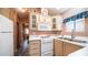 Updated kitchen featuring white cabinets and a convenient layout at 648 Hawks Eye Dr # 648, Apache Junction, AZ 85119