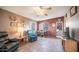 Living room with tiled floor, comfortable seating and access to patio at 648 Hawks Eye Dr # 648, Apache Junction, AZ 85119