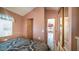 Main bedroom with view into hallway and another room at 648 Hawks Eye Dr # 648, Apache Junction, AZ 85119