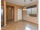 Dining area adjacent to the kitchen with tile floors at 2090 S Moccasin Trl, Gilbert, AZ 85295