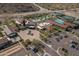 Aerial view of community pool, tennis courts, and clubhouse at 20960 W Mariposa St, Buckeye, AZ 85396