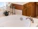 Oval bathtub with brushed nickel faucet and elegant decor at 13431 W Los Bancos Dr, Sun City West, AZ 85375