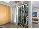 Impressive glass-enclosed wine cellar with ample storage for wine bottles at 10755 E Stoney Ln, Scottsdale, AZ 85262