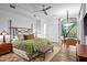 Large main bedroom with sitting area and access to a patio at 10755 E Stoney Ln, Scottsdale, AZ 85262