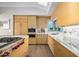 Modern kitchen with marble countertops and stainless steel appliances at 10755 E Stoney Ln, Scottsdale, AZ 85262
