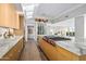 Bright kitchen with marble countertops, custom cabinetry, and a gas cooktop at 10755 E Stoney Ln, Scottsdale, AZ 85262