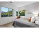 Bright bedroom with large windows and mountain views at 10755 E Stoney Ln, Scottsdale, AZ 85262
