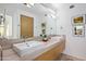 Modern bathroom with double sinks and sleek countertops at 10755 E Stoney Ln, Scottsdale, AZ 85262