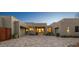 Modern home with attractive paver driveway and gate at 10755 E Stoney Ln, Scottsdale, AZ 85262