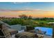 Luxury pool and patio with fire pit and mountain views at 10755 E Stoney Ln, Scottsdale, AZ 85262