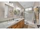 Elegant bathroom with granite vanity and double sinks at 44089 W Pioneer Rd, Maricopa, AZ 85139