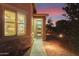 Inviting entryway with stone accents and a charming wreath at sunset at 2607 E San Simeon Dr, Casa Grande, AZ 85194