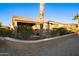 Landscaped backyard with a view of the house and surrounding area at 2607 E San Simeon Dr, Casa Grande, AZ 85194