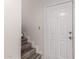 Modern staircase with gray laminate flooring at 16053 N 26Th Cir, Phoenix, AZ 85023