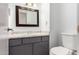 Clean bathroom with gray vanity and updated fixtures at 16053 N 26Th Cir, Phoenix, AZ 85023