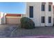 Townhouse exterior with attached garage and landscaping at 16053 N 26Th Cir, Phoenix, AZ 85023