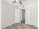 Bright bedroom featuring wood-look floors and ample closet space at 16053 N 26Th Cir, Phoenix, AZ 85023