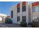 Townhouse exterior with attached garage and landscaping at 16053 N 26Th Cir, Phoenix, AZ 85023