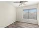 Bright bedroom with wood-look floors and window at 16053 N 26Th Cir, Phoenix, AZ 85023