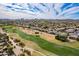 Aerial view of a neighborhood near a golf course at 30449 N Coral Bean Dr, San Tan Valley, AZ 85143