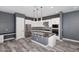 Modern kitchen with stainless steel appliances and an island at 6827 E Orion Dr, Scottsdale, AZ 85257