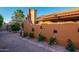 Landscaped backyard with roses and gravel pathway at 13128 N 104Th Pl, Scottsdale, AZ 85260