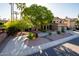 Two-story house with a double garage and landscaped yard at 13128 N 104Th Pl, Scottsdale, AZ 85260