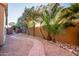 Landscaped backyard with brick pathway and desert plants at 13128 N 104Th Pl, Scottsdale, AZ 85260