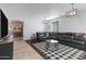 Spacious living room with sectional sofa and stylish coffee table at 26853 N 176Th Dr, Surprise, AZ 85387