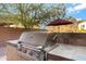 Built-in outdoor grill perfect for summer barbecues at 26853 N 176Th Dr, Surprise, AZ 85387