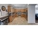 Well-equipped kitchen with wood cabinets and granite countertops at 26853 N 176Th Dr, Surprise, AZ 85387