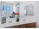 Bathroom with double vanity and large mirror at 26853 N 176Th Dr, Surprise, AZ 85387