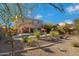 Spacious backyard with a swimming pool and desert landscaping at 26853 N 176Th Dr, Surprise, AZ 85387