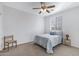 Cozy bedroom with carpeted floor and ceiling fan at 26853 N 176Th Dr, Surprise, AZ 85387