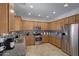 Updated kitchen with granite countertops and stainless steel appliances at 26853 N 176Th Dr, Surprise, AZ 85387
