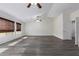 Spacious main bedroom with wood-look floors and high ceilings at 13635 W Calavar Rd, Surprise, AZ 85379