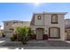 Two-story home with attached garage at 13635 W Calavar Rd, Surprise, AZ 85379
