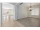 Dining room with chandelier and view into Gathering room at 13635 W Calavar Rd, Surprise, AZ 85379
