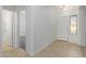 Bright entryway with tile flooring, leading to other rooms at 13635 W Calavar Rd, Surprise, AZ 85379