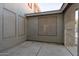 Small side patio with access to interior and side yard at 13635 W Calavar Rd, Surprise, AZ 85379