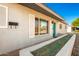 Newly renovated single-story home with a teal door and gravel landscaping at 101 W Shannon St, Chandler, AZ 85225