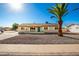 Single story home with a teal door, and rock landscaping at 101 W Shannon St, Chandler, AZ 85225