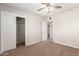 Bedroom with ceiling fan and sliding door closet at 101 W Shannon St, Chandler, AZ 85225