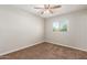 Simple bedroom with ceiling fan and window coverings at 101 W Shannon St, Chandler, AZ 85225
