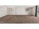 Bright living room with carpet flooring, fireplace, and sliding glass door at 101 W Shannon St, Chandler, AZ 85225